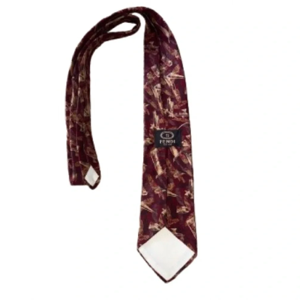 Fendi Burgundy Tie with abstract Pattern of reds, gold and gray